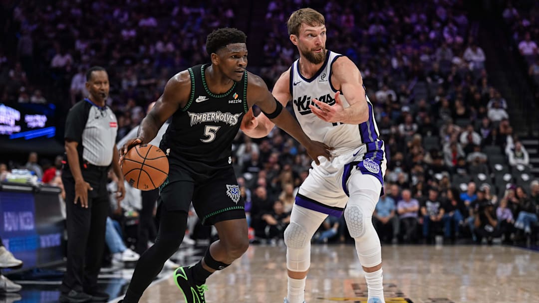 Nov 9, 2025; Sacramento, California, USA; Minnesota Timberwolves guard Anthony Edwards (5) dribbles the ball against Sacramento Kings forward Domantas Sabonis (11) during the third quarter at Golden 1 Center. Nov 9, 2025; Sacramento, California, USA; Minnesota Timberwolves guard Anthony Edwards (5) dribbles the ball against Sacramento Kings forward Domantas Sabonis (11) during the third quarter at Golden 1 Center.