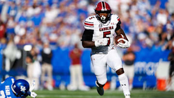 Sep 7, 2024; Lexington, Kentucky, USA; South Carolina Gamecocks running back Raheim Sanders (5) runs the ball during the third quarter against the Kentucky Wildcats at Kroger Field. Mandatory Credit: Jordan Prather-Imagn Images