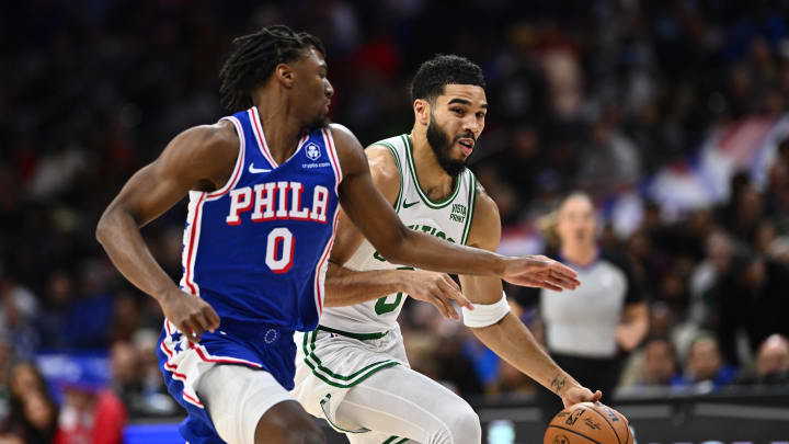 Nov 8, 2023; Philadelphia, Pennsylvania, USA; Boston Celtics forward Jayson Tatum (0) drives against Philadelphia 76ers guard Tyrese Maxey (0) in the first quarter at Wells Fargo Center. Mandatory Credit: Kyle Ross-USA TODAY Sports