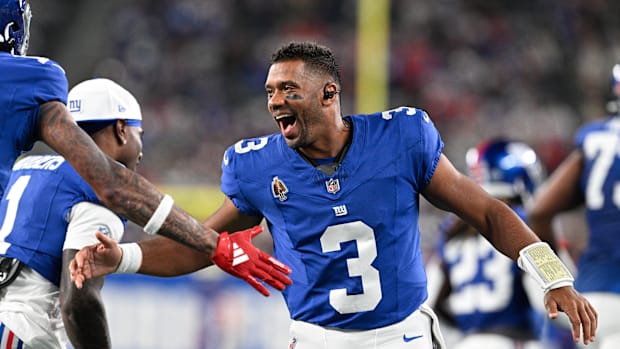 ew York Giants quarterback Russell Wilson celebrates a touchdown 