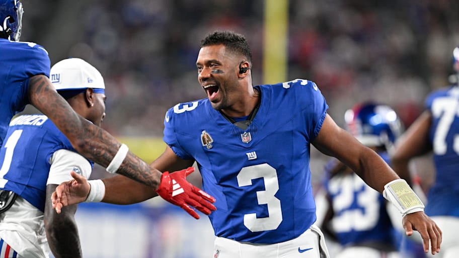ew York Giants quarterback Russell Wilson celebrates a touchdown