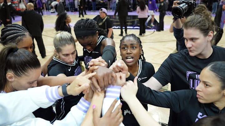 Golden State Valkyries players huddle on the court after the game against the Los Angeles Sparks at Chase Center.