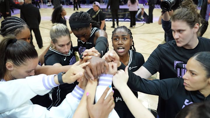Golden State Valkyries players huddle on the court after the game against the Los Angeles Sparks at Chase Center.