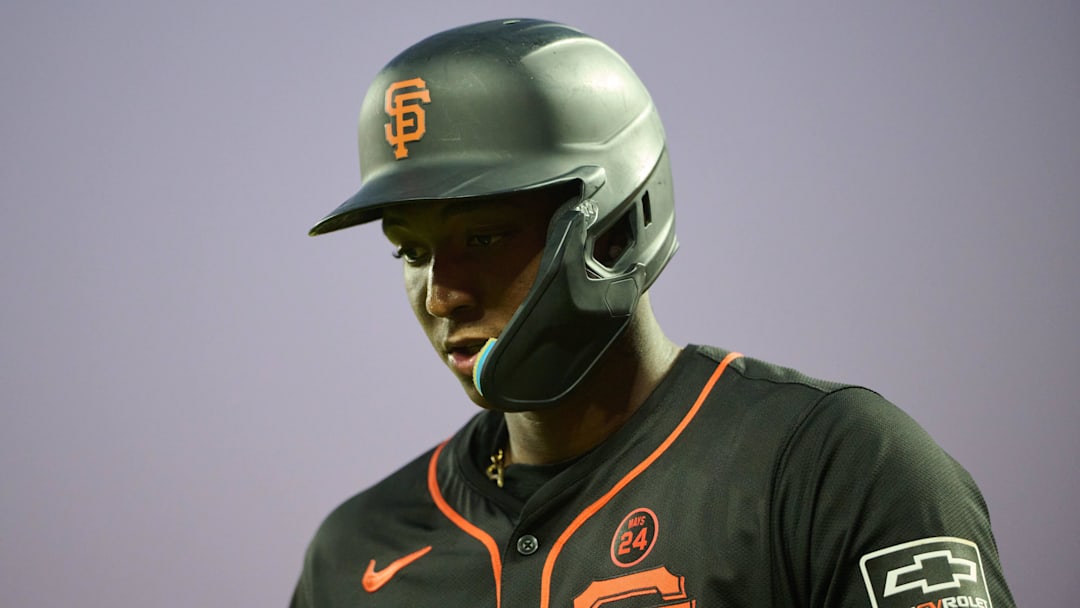 Sep 14, 2024; San Francisco, California, USA; San Francisco Giants infielder Marco Luciano (37) reacts after striking out against the San Diego Padres during the fifth inning at Oracle Park. Mandatory Credit: Robert Edwards-Imagn Images