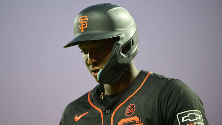 Sep 14, 2024; San Francisco, California, USA; San Francisco Giants infielder Marco Luciano reacts after striking out.