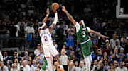 Oct 27, 2025; Dallas, Texas, USA; Oklahoma City Thunder guard Shai Gilgeous-Alexander (2) makes a jump shot over Dallas Mavericks forward Anthony Davis (3) during the second half at the American Airlines Center. Mandatory Credit: Jerome Miron-Imagn Images