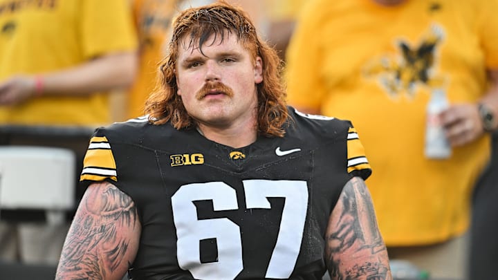 Sep 13, 2025; Iowa City, Iowa, USA; Iowa Hawkeyes offensive lineman Gennings Dunker (67) looks on before the game against the Massachusetts Minutemen at Kinnick Stadium. Mandatory Credit: Jeffrey Becker-Imagn Images