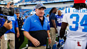 Sep 6, 2025; Lexington, Kentucky, USA; Kentucky Wildcats head coach Mark Stoops makes his way off the field after the game against the Mississippi Rebels at Kroger Field. Mandatory Credit: Jordan Prather-Imagn Images