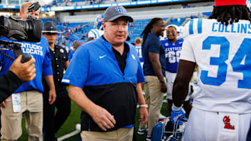 Sep 6, 2025; Lexington, Kentucky, USA; Kentucky Wildcats head coach Mark Stoops makes his way off the field after the game against the Mississippi Rebels at Kroger Field. Mandatory Credit: Jordan Prather-Imagn Images