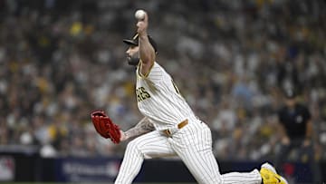 Oct 2, 2024; San Diego, California, USA; San Diego Padres pitcher Tanner Scott (66) throws during the sixth inning of game two in the Wildcard round for the 2024 MLB Playoffs against the Atlanta Braves at Petco Park.