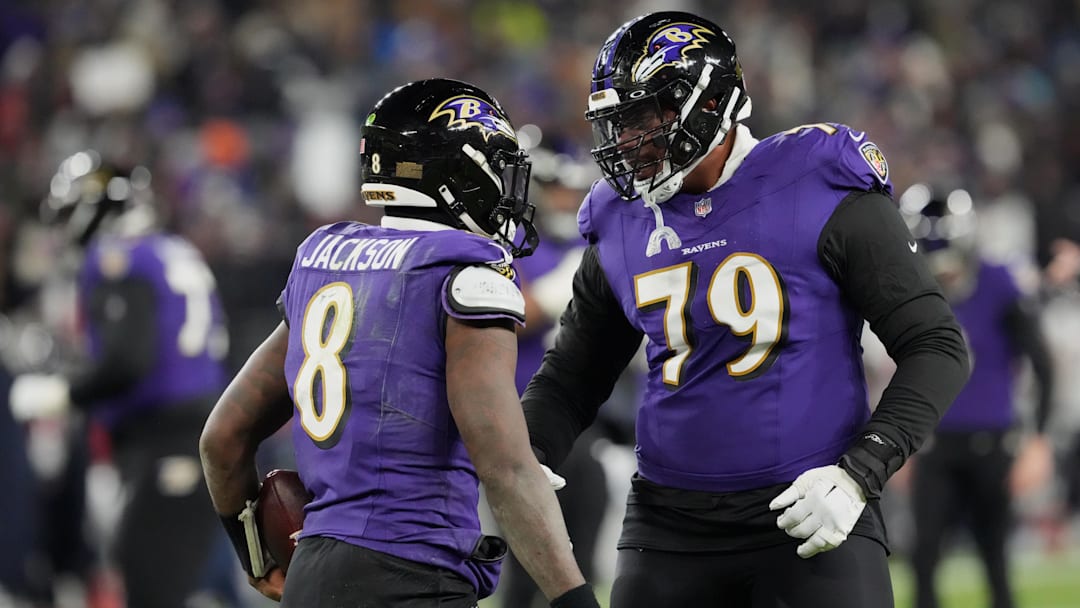 Jan 20, 2024; Baltimore, MD, USA; Baltimore Ravens quarterback Lamar Jackson (8) celebrates with offensive tackle Ronnie Stanley (79) after scoring a touchdown against the Houston Texans during the third quarter of a 2024 AFC divisional round game at M&T Bank Stadium. Mandatory Credit: Mitch Stringer-Imagn Images