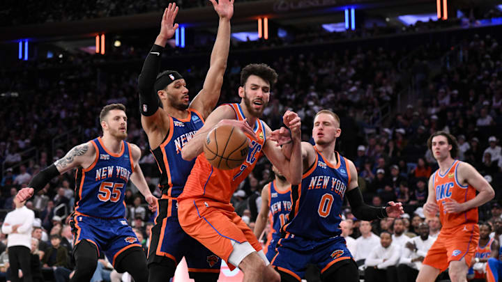 Mar 31, 2024; New York, New York, USA; Oklahoma City Thunder forward Chet Holmgren (7) looks to shoot against New York Knicks guard Josh Hart (3) and New York Knicks guard Donte DiVincenzo (0) during the third quarter at Madison Square Garden. Mandatory Credit: John Jones-Imagn Images