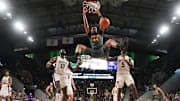 Baylor Bears center Caden Powell (44) dunks the ball against the Washington Huskies during the second half at Paul and Alejandra Foster Pavilion