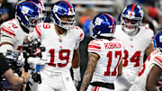 Nov 23, 2025; Detroit, Michigan, USA; New York Giants wide receiver Wan'Dale Robinson (17) celebrates a touchdown with New York Giants quarterback Jameis Winston (19) in the first quarter against the Detroit Lions at Ford Field.  