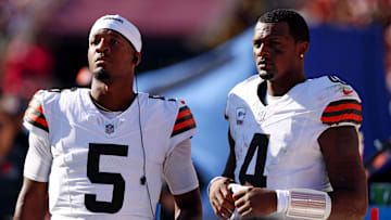 Oct 6, 2024; Landover, Maryland, USA; Cleveland Browns quarterback Deshaun Watson (4) and quarterback Jameis Winston (5) stand on the sideline during the fourth quarter of the game against the Washington Commanders at NorthWest Stadium. Mandatory Credit: Peter Casey-Imagn Images