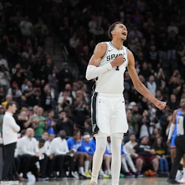 Feb 29, 2024; San Antonio, Texas, USA; San Antonio Spurs center Victor Wembanyama (1) celebrates in the second half against the Oklahoma City Thunder at Frost Bank Center.