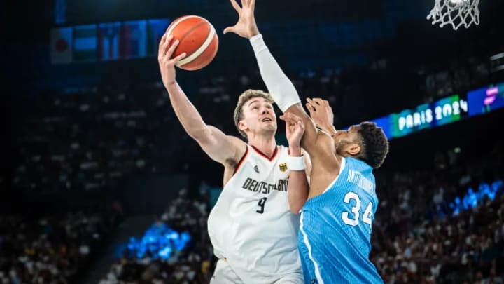 Franz Wagner goes up at the rim against Giannis Antetokounmpo in Olympic quarterfinal play on Tuesday.