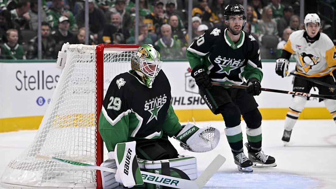 Dec 7, 2025; Dallas, Texas, USA; Dallas Stars goaltender Jake Oettinger (29) and defenseman Kyle Capobianco (20) faces the Pittsburgh Penguins attack during the first period at American Airlines Center. Mandatory Credit: Jerome Miron-Imagn Images