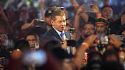 WWE owner Vince McMahon enters the arena during WrestleMania 