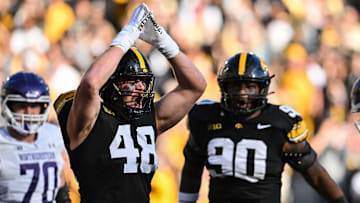 Oct 26, 2024; Iowa City, Iowa, USA; Iowa Hawkeyes defensive lineman Max Llewellyn (48) reacts after a safety against the Northwestern Wildcats during the second quarter at Kinnick Stadium. Mandatory Credit: Jeffrey Becker-Imagn Images