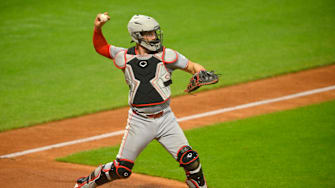 Sep 24, 2024; Cleveland, Ohio, USA; Cincinnati Reds catcher Tyler Stephenson (37) throws to first base in the fifth inning against the Cleveland Guardians at Progressive Field. Mandatory Credit: David Richard-Imagn Images