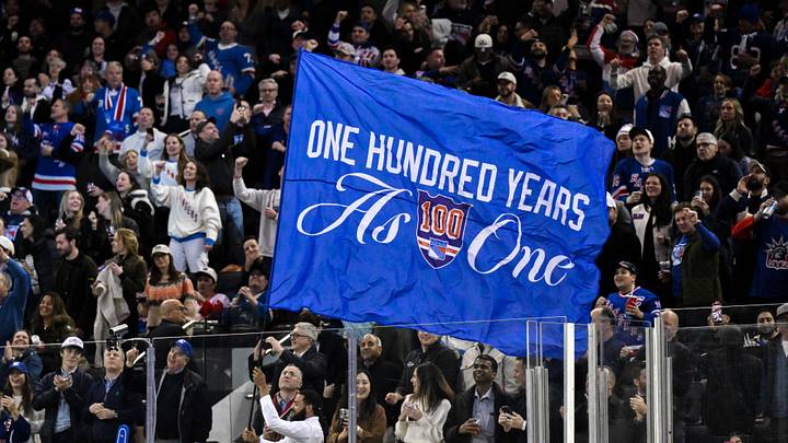 Nov 16, 2025; New York, New York, USA; General view of a flag being waved by New York Rangers staff during the second period against the Detroit Red Wings at Madison Square Garden. Mandatory Credit: John Jones-Imagn Images