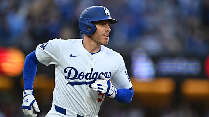 Mar 29, 2025; Los Angeles, California, USA; Los Angeles Dodgers first baseman Freddie Freeman (5) hits a home run during the 1st inning against the Detroit Tigers at Dodger Stadium. Mandatory Credit: Jonathan Hui-Imagn Images Mar 29, 2025; Los Angeles, California, USA; Los Angeles Dodgers first baseman Freddie Freeman (5) hits a home run during the 1st inning against the Detroit Tigers at Dodger Stadium. Mandatory Credit: Jonathan Hui-Imagn Images