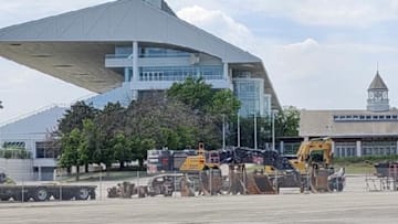 The old Arlington International Racecourse grandstand and building are gone and now the Bears tax dispute soon will be.