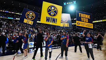 May 3, 2025; Denver, Colorado, USA; Denver Nuggets support staff celebrate the win over the LA Clippers following game seven of first round for the 2025 NBA Playoffs at Ball Arena. Mandatory Credit: Ron Chenoy-Imagn Images