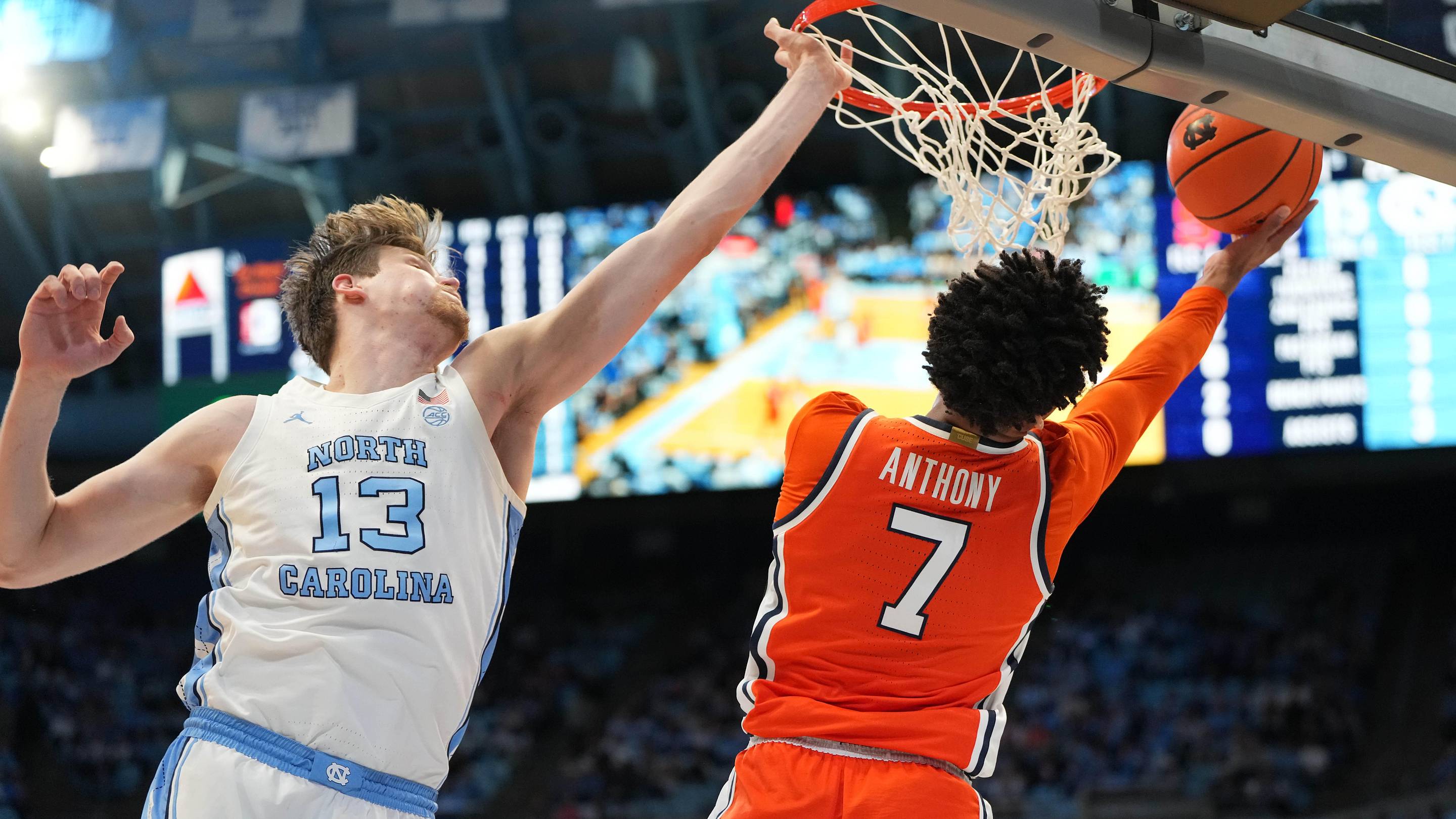 Feb 2, 2026; Chapel Hill, North Carolina, USA; Syracuse Orange forward Kiyan Anthony (7) shoots as North Carolina Tar Heels center Henri Veesaar (13) defends in the first half at Dean E. Smith Center. Mandatory Credit: Bob Donnan-Imagn Images
