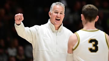 Purdue Boilermakers head coach Matt Painter reacts with guard Braden Smith (3)