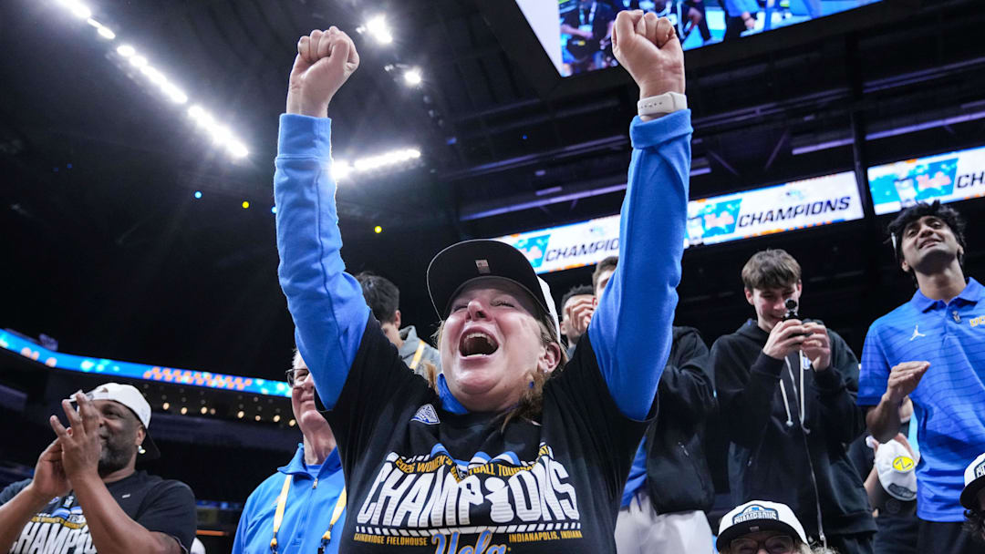 UCLA Bruins head coach Cori Close yells in excitement Sunday, March 8, 2026, after the Big Ten Tournament Championship game at Gainbridge Fieldhouse in Indianapolis. UCLA Bruins defeat the Iowa Hawkeyes, 96-45, for back to back Big Ten championships.