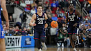 Connecticut Huskies guard Aidan Mahaney (20) controls the ball during the second half against the Florida Gators in the second round of the NCAA Tournament at Lenovo Center