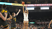 Jan 30, 2025; Austin, Texas, USA; Texas Longhorns guard Jordan Lee (7) shoots over Missouri Tigers guard Grace Slaughter (0) during the first half at Moody Center. Mandatory Credit: Scott Wachter-Imagn Imagesl
