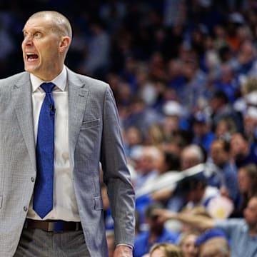 Mar 1, 2025; Lexington, Kentucky, USA; Kentucky Wildcats head coach Mark Pope yells to his players during the second half against the Auburn Tigers at Rupp Arena at Central Bank Center. Mandatory Credit: Jordan Prather-Imagn Images