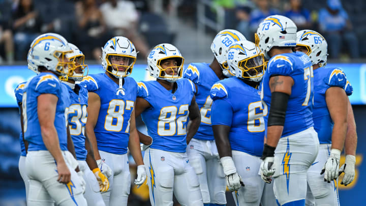 Aug 10, 2024; Inglewood, California, USA; Los Angeles Chargers wide receiver Brenden Rice (82), wide receiver Simi Fehoko (87), guard Willis Patrick (66) and other teammates against the Seattle Seahawks during the third quarter at SoFi Stadium. Mandatory Credit: Jonathan Hui-USA TODAY Sports