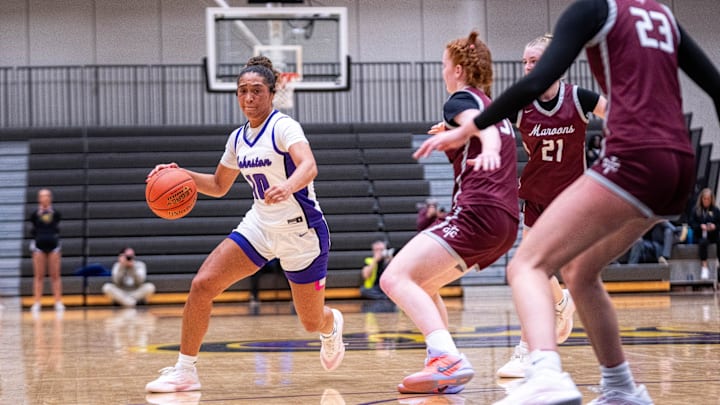 Johnston's Jenica Lewis (10) takes the ball down the court on Dec. 16, 2025, at Johnston High School.