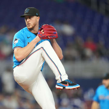 Jun 9, 2024; Miami, Florida, USA; Miami Marlins starting pitcher Trevor Rogers (28) pitches against the Cleveland Guardians in the first inning at loanDepot Park.