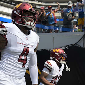 Washington Commanders linebacker Frankie Luvu had his one-game suspension overturned.