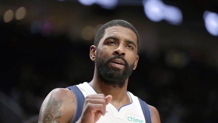 Dec 8, 2023; Portland, Oregon, USA; Dallas Mavericks point guard Kyrie Irving (11) reacts  during the first half against the Portland Trail Blazers at Moda Center. Mandatory Credit: Soobum Im-USA TODAY Sports