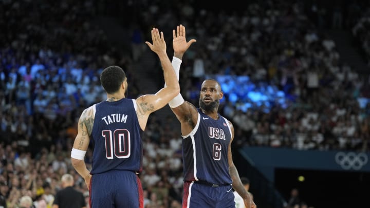 Aug 6, 2024; Paris, France; United States guard LeBron James (6) and small forward Jayson Tatum (10) react in the first half against Brazil in a men’s basketball quarterfinal game during the Paris 2024 Olympic Summer Games at Accor Arena. Mandatory Credit: Kyle Terada-USA TODAY Sports