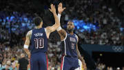 Aug 6, 2024; Paris, France; United States guard LeBron James (6) and small forward Jayson Tatum (10) react in the first half against Brazil in a men’s basketball quarterfinal game during the Paris 2024 Olympic Summer Games at Accor Arena. Mandatory Credit: Kyle Terada-USA TODAY Sports