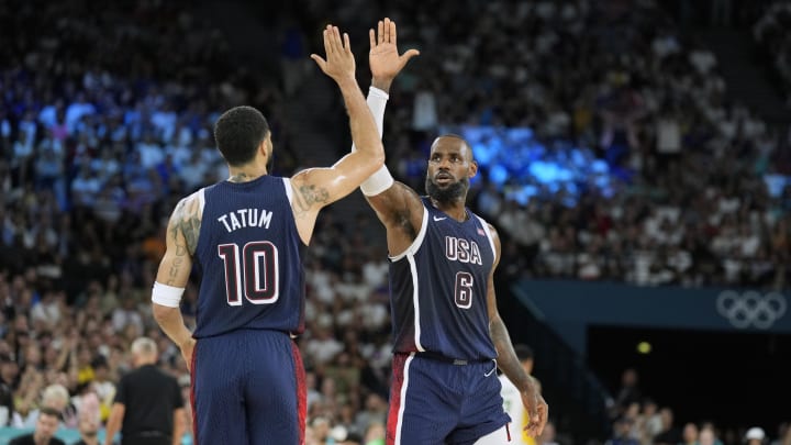 Aug 6, 2024; Paris, France; United States guard LeBron James (6) and small forward Jayson Tatum (10) react in the first half against Brazil in a men’s basketball quarterfinal game during the Paris 2024 Olympic Summer Games at Accor Arena. Mandatory Credit: Kyle Terada-USA TODAY Sports