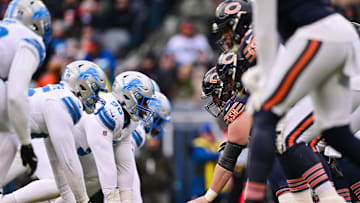Dec 22, 2024; Chicago, Illinois, USA; Detroit Lions and Chicago Bears line up during the fourth quarter at Soldier Field. Mandatory Credit: Daniel Bartel-Imagn Images