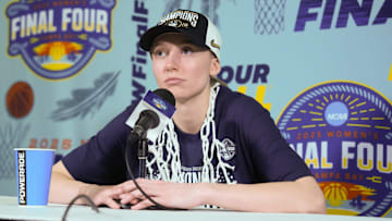Apr 6, 2025; Tampa, FL, USA; Connecticut Huskies guard Paige Bueckers (5) speaks to the media after the national championship of the women's 2025 NCAA tournament against the South Carolina Gamecocks at Amalie Arena. Mandatory Credit: Kirby Lee-Imagn Images