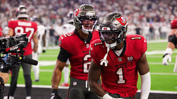 Tampa Bay Buccaneers RB Rachaad White (1) celebrates after scoring a touchdown during the fourth quarter against the Houston Texans at NRG Stadium.
