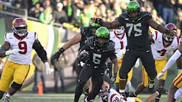 Nov 22, 2025; Eugene, Oregon, USA; Noah Whittington gashed the Trojans for 104 yards on 19 carries.
