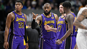 Los Angeles Lakers forward Rui Hachimura (28) and forward LeBron James (23) and guard Luka Doncic (77), and forward Dorian Finney-Smith (17) during a game at American Airlines Center.