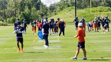 Freddie Swain (86) runs through a receiving drill during Sunday's Bears practice.