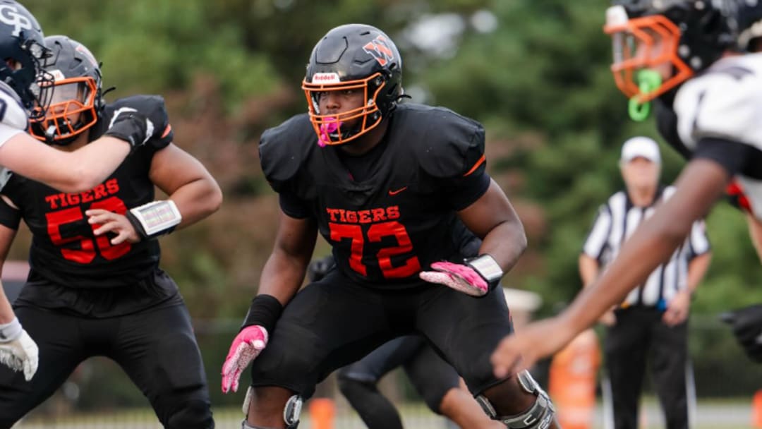 2027 offensive tackle prospect Junior Saunders blocks for Woodberry Forest in Virginia.